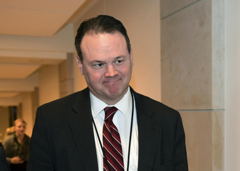 FILE - In this Jan. 17, 2018, file photo, Rick Dearborn, President Donald Trump's White House deputy chief of staff for legislative affairs, walks on Capitol Hill in Washington, where he is being interviewed by the House Intelligence Committee regarding the Russia probe. The White House has instructed Dearborn and another former aide to President Donald Trump not to appear at a House Judiciary Committee hearing Tuesday, Sept. 17, 2019, saying Dearborn and Rob Porter are "absolutely immune" from testifying at what the panel is calling its first impeachment hearing. (AP Photo/Susan Walsh, File)