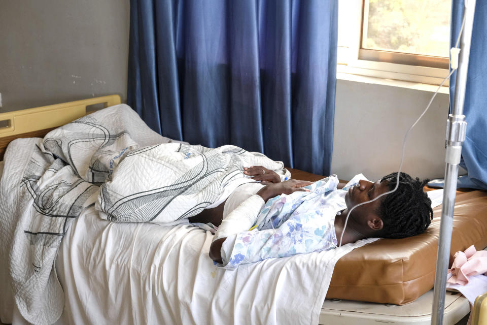 Ugandan LGBTQ+ activist Steven Kabuye receives treatment at a hospital after he was attacked by unknown people, in Kitende on the outskirts of Kampala, Uganda, Thursday, Jan. 4, 2024. Kabuye, a well-known gay rights activist was stabbed by unknown assailants Wednesday, and police said he was hospitalized in critical condition. (AP Photo/Hajarah Nalwadda)