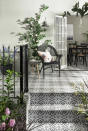 <p> Make your garden steps part of your patio by covering them all in the same flooring. Not only will it help merge the spaces and create a seamless look, but also, if you go for a bold color or pattern, it will increase the impact too.&#xA0; </p> <p> These patterned tiles look chic teamed with simple black iron railings and handrails. </p>