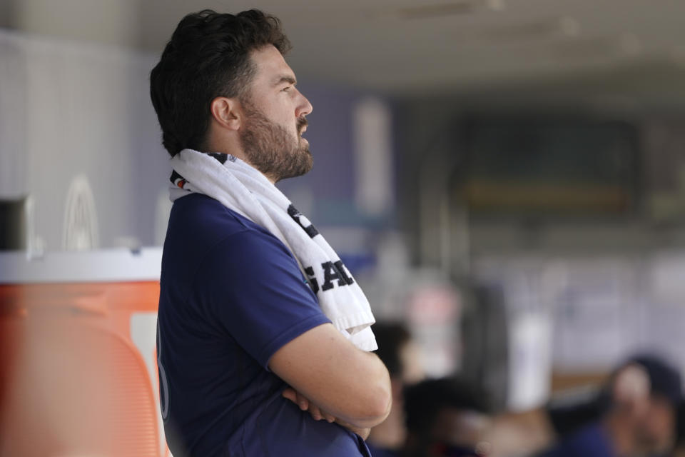 Seattle Mariners starting pitcher Robbie Ray stands in the dugout after pitching the sixth inning of the team's baseball game against the Oakland Athletics, Wednesday, May 25, 2022, in Seattle. (AP Photo/Ted S. Warren)