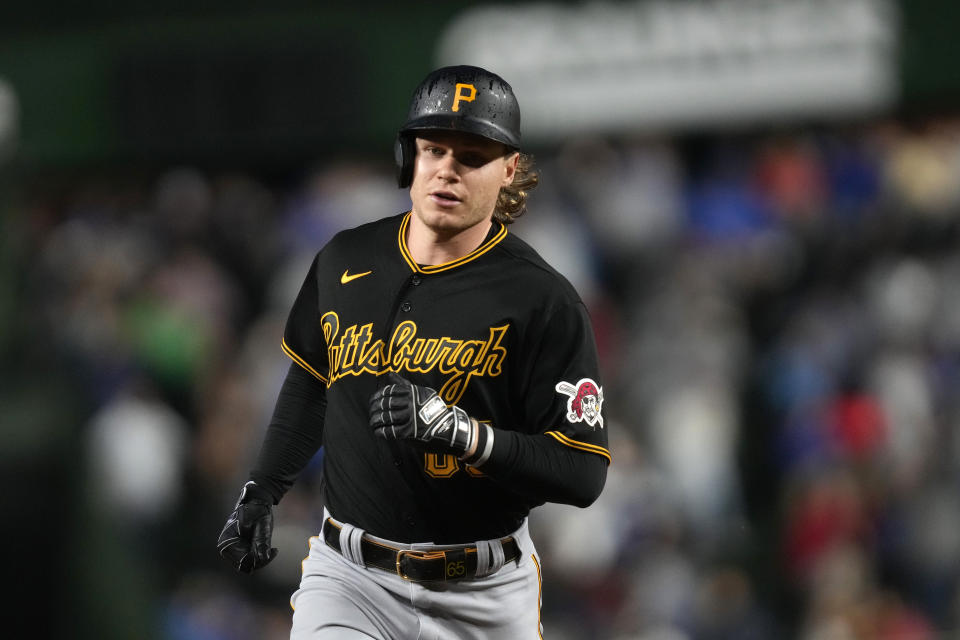 Pittsburgh Pirates' Jack Suwinski rounds the bases after his home run off Chicago Cubs starting pitcher Jameson Taillon during the first inning of a baseball game Tuesday, June 13, 2023, in Chicago. (AP Photo/Charles Rex Arbogast)