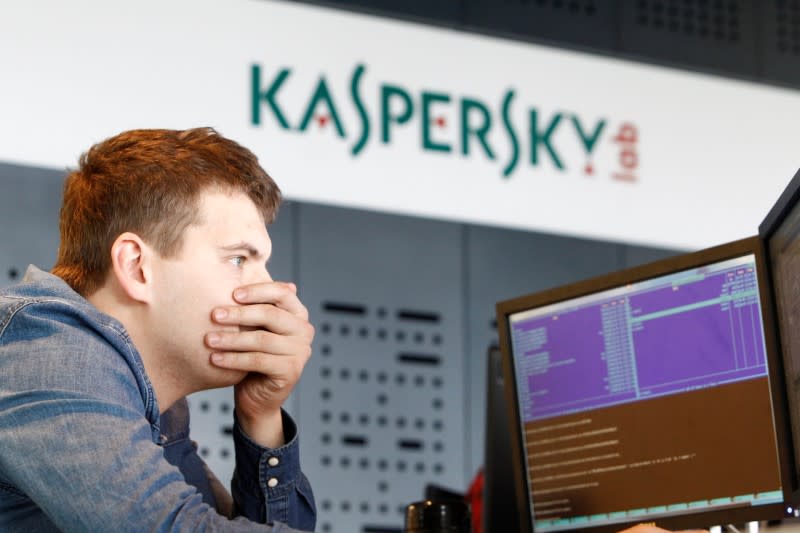 FILE PHOTO: An employee works near screens in the virus lab at the headquarters of Russian cyber security company Kaspersky Labs in Moscow July 29, 2013. REUTERS/Sergei Karpukhin/File Photo