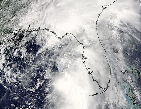 Tropical Storm Colin is seen over the Gulf of Mexico in this image from the moderate-resolution imaging spectroradiometer (MODIS) aboard NASA's Terra satellite taken at 12:20 ET (16:20 GMT) June 6, 2016. NASA/Handout via Reuters