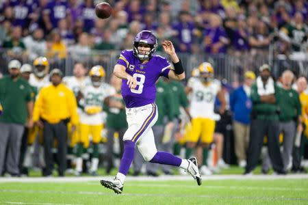 Nov 25, 2018; Minneapolis, MN, USA; Minnesota Vikings quarterback Kirk Cousins (8) passes the ball during the third quarter against the Green Bay Packers at U.S. Bank Stadium. Mandatory Credit: Harrison Barden-USA TODAY Sports