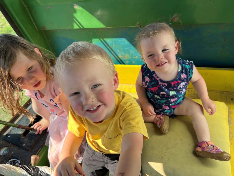 Beth Hintz is opening a play cafe for children and adults in Tea this September. Here, her daughters Adeline, 3, and Avalee play with their friend Brett Erickson.