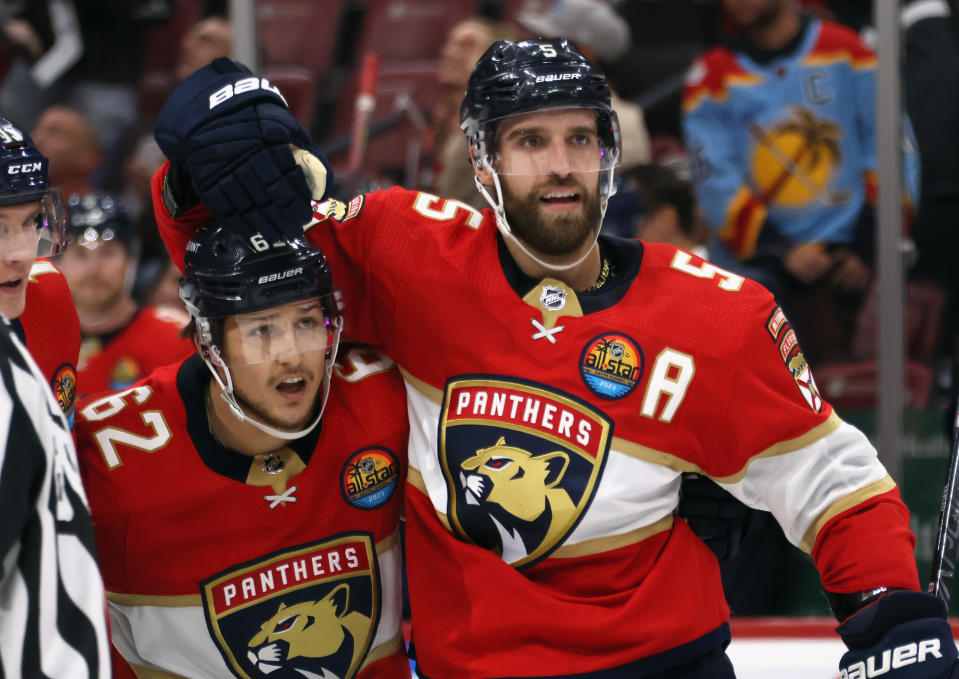 Aaron Ekblad #5 and Brandon Montour #62 will both be sidelined to begin the NHL season. (Photo by Bruce Bennett/Getty Images)