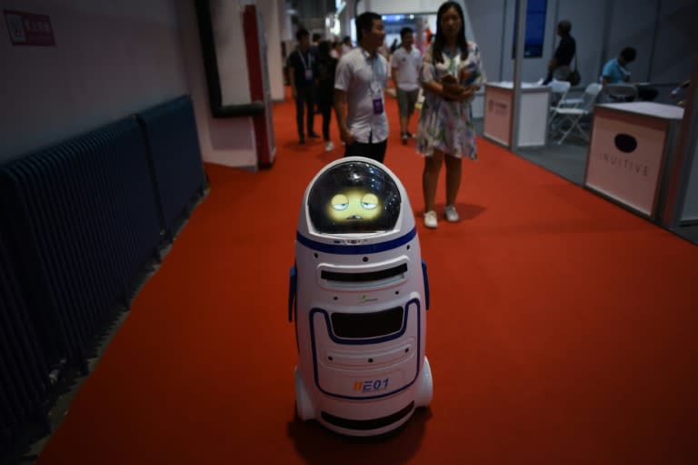 Outside China's factories, robots are becoming a more visible presence, deployed in restaurants and banks and even delivering parcels