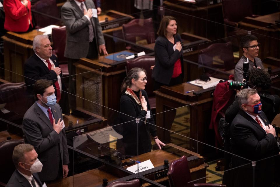 Electors recite the Pledge of Allegiance during Tennessee’s 2020 Electoral College at the State Capitol in Nashville, Tenn., Monday, Dec. 14, 2020.