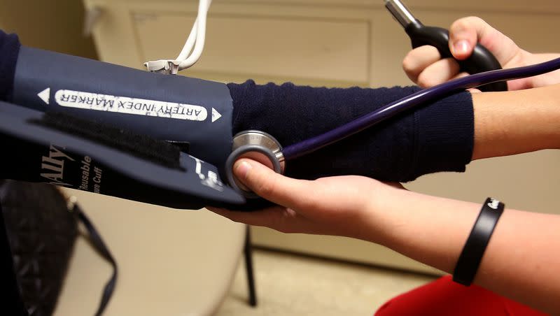 Doreen Genow has her blood pressure checked by Brandi Jacketta, M.A. at the Redwood Health Center in Salt Lake City on Friday, Sept. 11, 2015. More intensive management of high blood pressure, below a commonly recommended blood pressure target, significantly reduces rates of cardiovascular disease, and lowers risk of death in a group of adults 50 years and older with high blood pressure. This is according to the initial results of a landmark clinical trial sponsored by the National Institutes of Health called the Systolic Blood Pressure Intervention Trial (SPRINT).