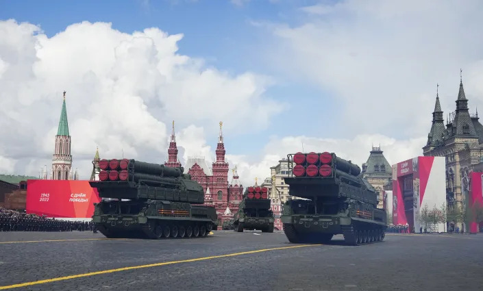 Russian military vehicles roll during the Victory Day military parade in Moscow, Russia, Monday, May 9, 2022, marking the 77th anniversary of the end of World War II. (AP Photo/Alexander Zemlianichenko)