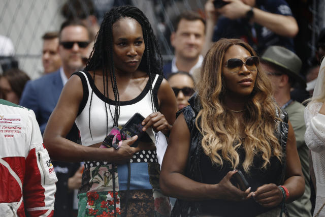 MIAMI, FLORIDA - MAY 07: Venus Williams and Serena Williams watch the grid presentation prior to the F1 Grand Prix of Miami at Miami International Autodrome on May 07, 2023 in Miami, Florida. (Photo by Jared C. Tilton/Getty Images)