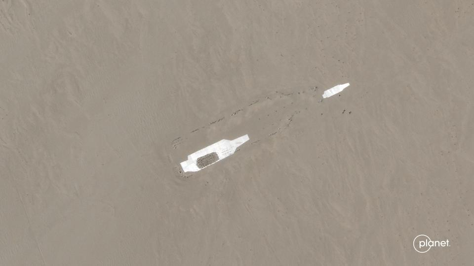 Two smaller carrier targets and an outline of a larger one in a satellite image taken July 28, 2023.