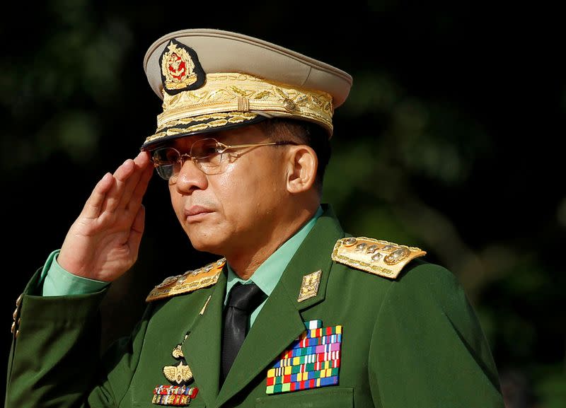 FILE PHOTO: Myanmar Commander in Chief Senior General Min Aung Hlaing salutes as he attends an event marking the anniversary of Martyrs' Day at the Martyrs' Mausoleum in Yangon