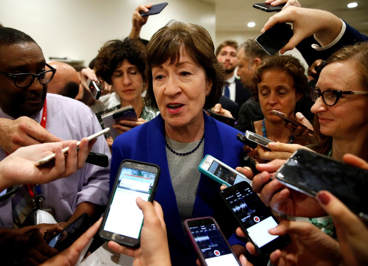 Sen. Susan Collins (R-Maine) is mobbed by reporters who know she's not a fan of her party's Obamacare repeal bills. (Photo: Joshua Roberts / Reuters)