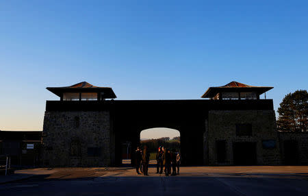 Visitors are seen inside the former concentration camp in Mauthausen, Austria, November 29, 2016.Picture taken November 29, 2016.REUTERS/Leonhard Foeger/Files