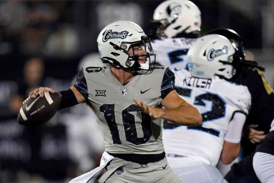 UCF quarterback John Rhys Plumlee (10) throws a pass during the first half of the NCAA college football team's annual spring game, Friday, April 14, 2023, in Orlando.