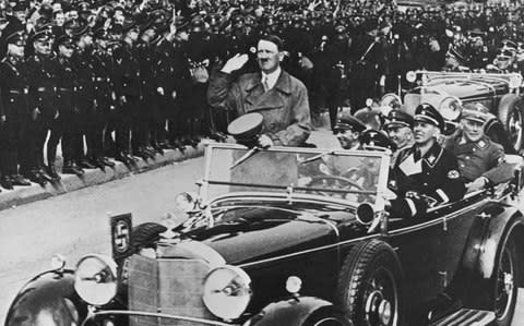 Adolf Hitler en route to a rally in Nuremberg, 1935 - Credit: Getty