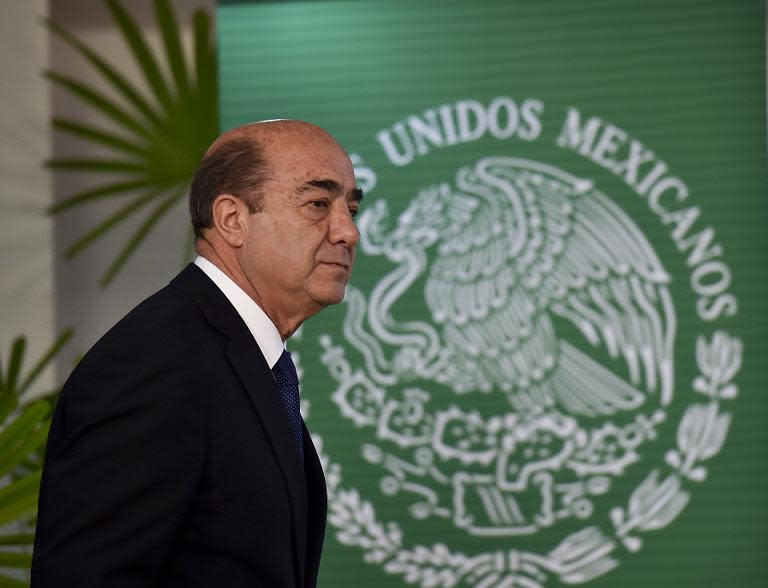 Mexico's Attorney General Jesus Murillo Karam arrives for a press conference at the Attorney General building in Mexico City on October 22, 2014