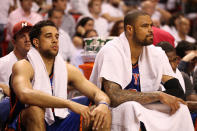 MIAMI, FL - MAY 09: Tyson Chandler (R) and Landry Fields of the New York Knicks sit on the bench against the Miami Heat in Game Five of the Eastern Conference Quarterfinals in the 2012 NBA Playoffs on May 9, 2012 at the American Airines Arena in Miami, Florida. Miami defeated the Knicks 106-94 to advance to the next round four games to one. NOTE TO USER: User expressly acknowledges and agrees that, by downloading and or using this photograph, User is consenting to the terms and conditions of the Getty Images License Agreement. (Photo by Marc Serota/Getty Images)