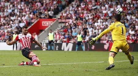 Britain Football Soccer - Southampton v Swansea City - Premier League - St Mary's Stadium - 18/9/16 Southampton's Charlie Austin shoots at goal Reuters / Peter Nicholls/ Livepic