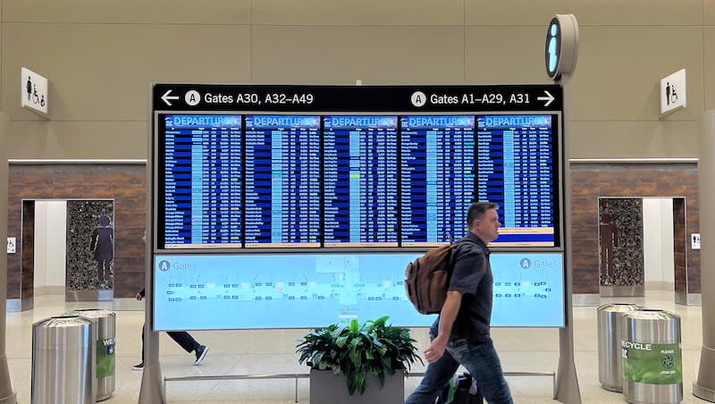 A passenger walks through the Salt Lake City International Airport Saturday, March 2, 2024.