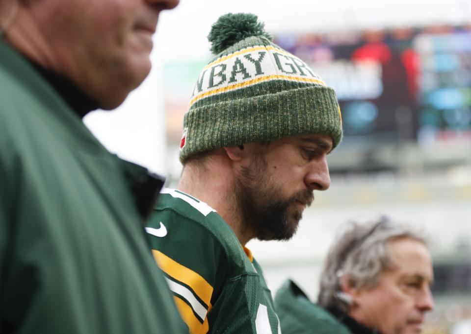 CORRECTS TO REMOVE SCORE- Green Bay Packers' Aaron Rodgers is taken to the locker room to be evaluated during the first half of an NFL football game against the Detroit Lions Sunday, Dec. 30, 2018, in Green Bay, Wis. (AP Photo/Matt Ludtke)