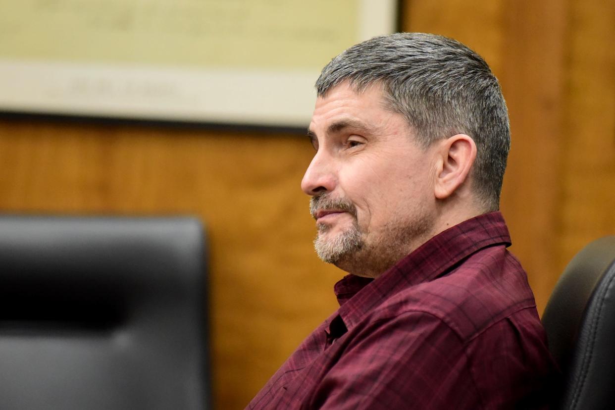 Robert Len Hamman, 54, listens as witness testifies Friday during his murder trial in Richland County Common Pleas Court.