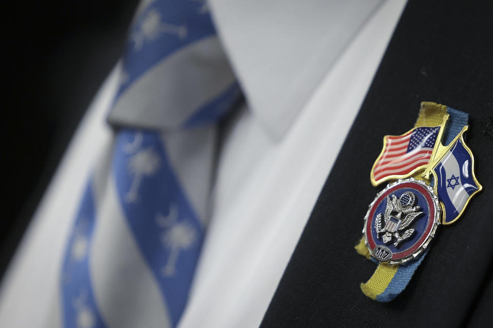  Rep. Joe Wilson (R-SC) wears a pin with the Israeli and American flags as he greets family members of hostages being held by Hamas on Capitol Hill Nov. 29, 2023 in Washington, D.C. (Photo by Win McNamee/Getty Images)