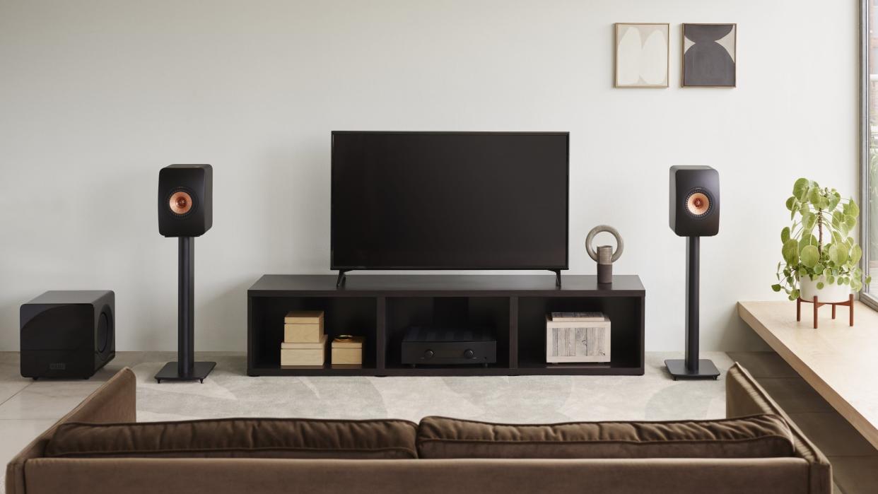  KEF LS50 Meta speakers in living room environment with TV. 