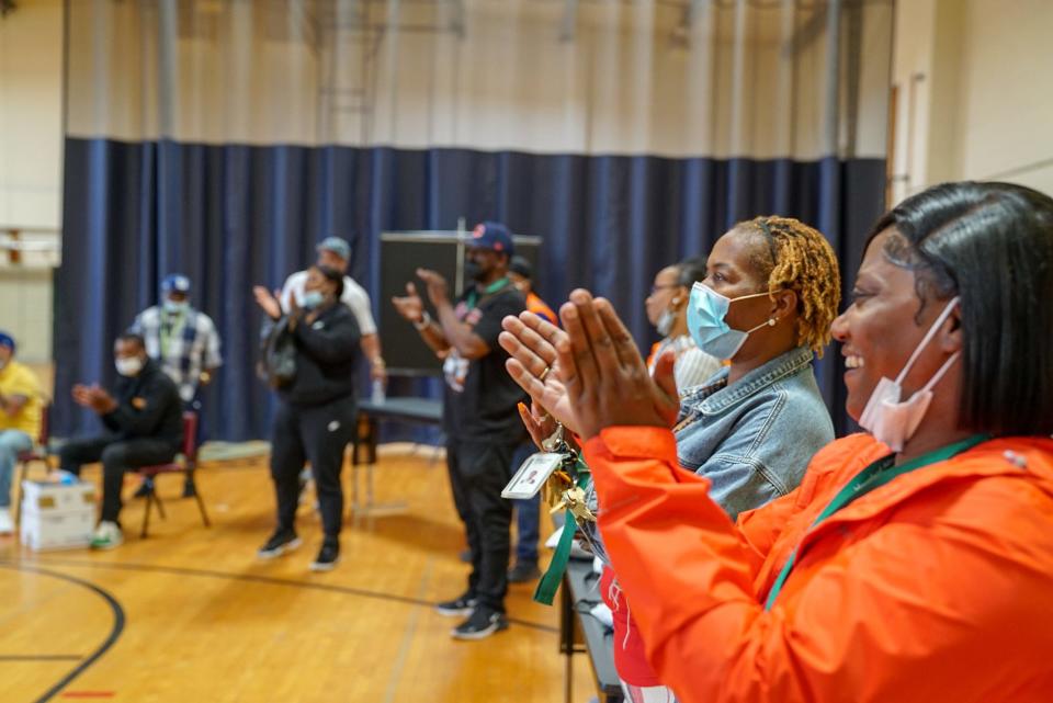 READI Chicago staff and participants celebrate participant graduations and accomplishments in the Austin/West Garfield Park community in Chicago, Illinois, on July 9, 2021.