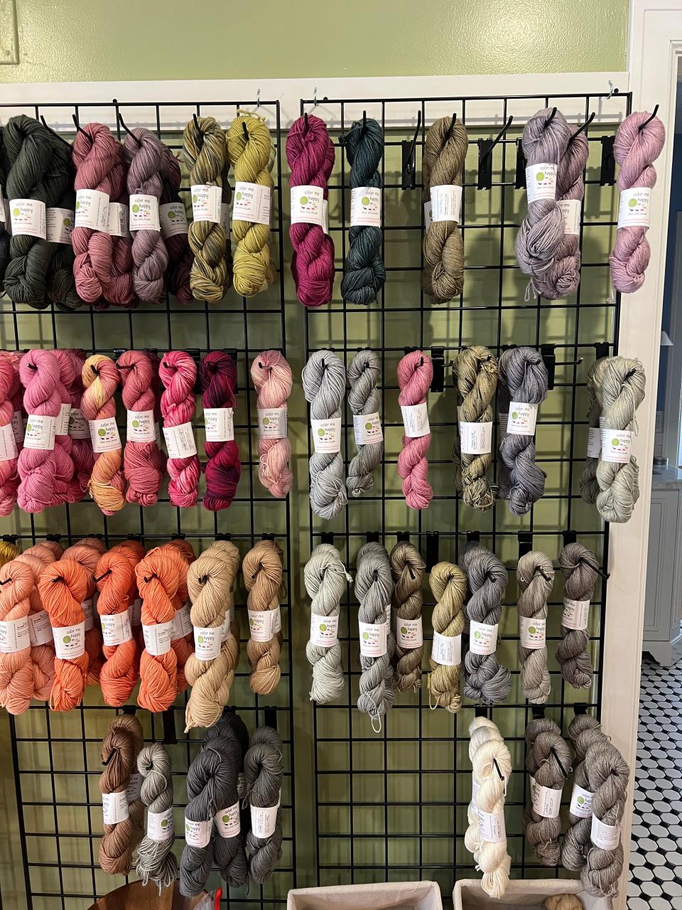 Michelle Saylers and Linda Williams have a wall of hand-made dyed yarns. They’ve been making sure to pack each and every bundle of yarn and fabric that they dye in sustainable plastic as well as show people the vibrant colors you can get from plants and vegetables.