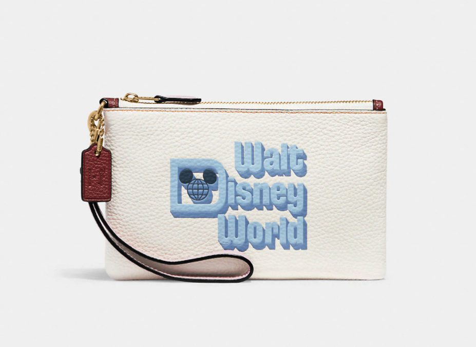 Disney X Coach Small Wristlet With Walt Disney World Motif. Image via Coach.