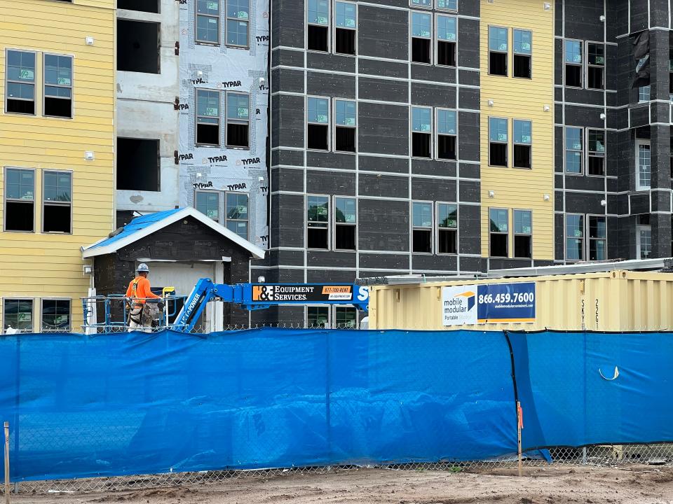 Construction continues on the Sanctuary at Daytona Apartments going up at 1600 LPGA Boulevard east of Clyde Morris Boulevard in Daytona Beach on July 17, 2023. The 336-unit luxury apartment complex is one of several either completed in recent years or in the works in Daytona Beach's fast-growing LPGA area.