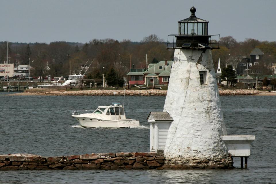 Palmer's Island is a land mass just inside the storm barrier in New Bedford harbor. It features a lighthouse, which was built 1894, and remained operational until it was deactivated in 1963.