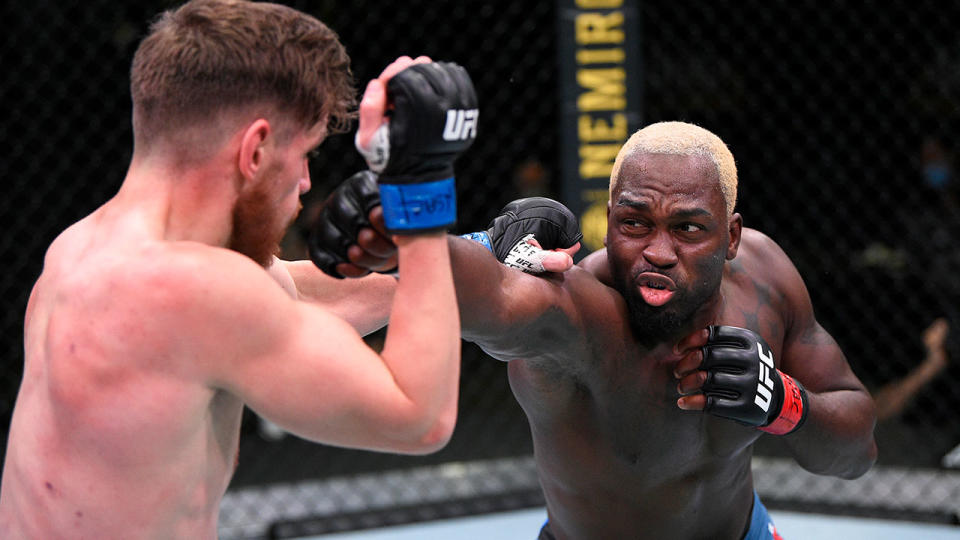 Seen here, Derek Brunson throws a right hand at Edmen Shahbazyan. 