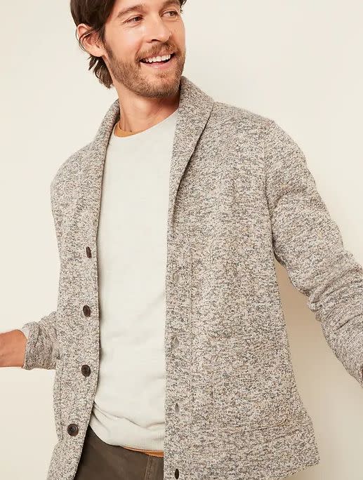 This Sweater-Fleece Shawl-Collar Cardigan for Men is available in sizes XS to XL. <a href="https://oldnavy.gap.com/browse/product.do?pid=595430002&amp;cid=63315&amp;pcid=63315&amp;vid=1&amp;nav=meganav%3AMen%3AShop%20Men%E2%80%99s%20Categories%3ASweaters&amp;grid=pds_10_82_1&amp;cpos=10&amp;cexp=1504&amp;kcid=CategoryIDs%3D63315&amp;cvar=11299&amp;ctype=Listing&amp;cpid=res20111109741914295471233&amp;ccam=4050#pdp-page-content" target="_blank" rel="noopener noreferrer">Get it on sale for 50% off (normally $45) at Old Navy</a>.