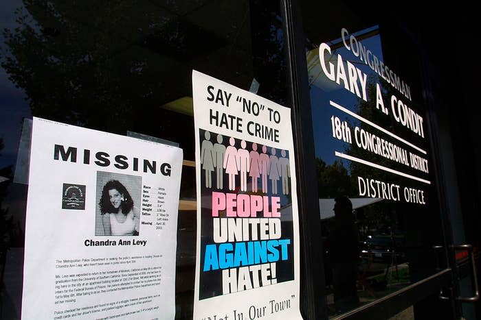 A missing poster for Chandra Ann Levy and an anti-hate crime sign are displayed on the door of Congressman Gary A. Condit's 18th Congressional District office