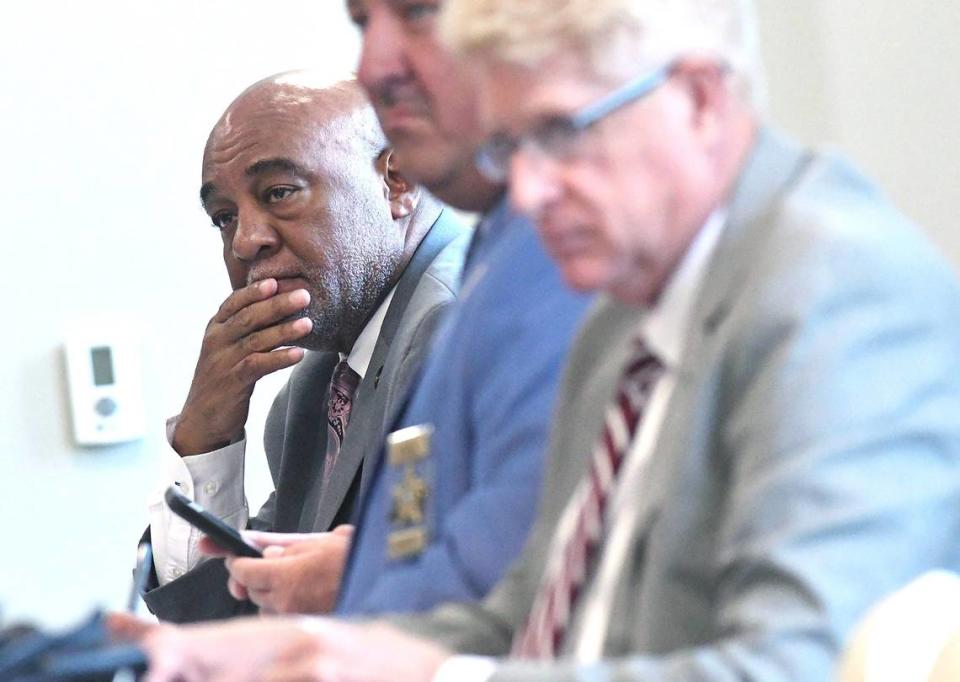 Anson County Sheriff Landric Reid. left, listens as Assistant Attorney General Bob Pickett presents cases during the North Carolina Sheriffs’ Education and Training Standards Full Commission meeting Thursday June 16, 2022 at the Brunswick County Courthouse in Bolivia, NC.