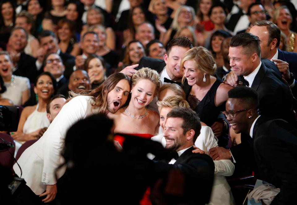 Ellen DeGeneres gathers members from the audience for a selfie, from backstage at the 86th Annual Academy Awards on Sunday, March 2, 2014 at the Dolby Theatre at Hollywood & Highland Center in Hollywood, CA