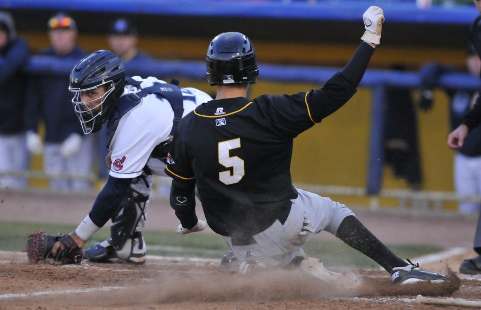 Some players in Single-A earn only $500 per week. <a href="https://www.gettyimages.com/detail/news-photo/catcher-alex-lavisky-of-the-lake-county-captains-prepares-news-photo/143087859?adppopup=true" rel="nofollow noopener" target="_blank" data-ylk="slk:David Dermer/Diamond Images via Getty Images;elm:context_link;itc:0;sec:content-canvas" class="link ">David Dermer/Diamond Images via Getty Images</a>