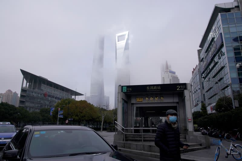 A man wearing a face mask is seen on a street in Shanghai