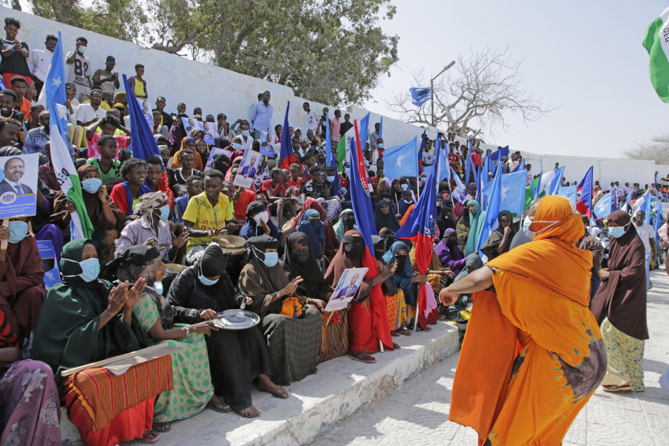 Residents and officials lead a demonstration supporting the government at Banadir stadium, Mogadishu, Thursday Jan. 12, 2023. The government rally encouraged an uprising against the al-Shabab group amid a month long military offensive. (AP Photo/Farah Abdi Warsameh)