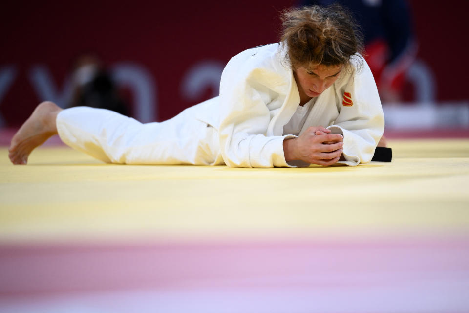 <p>Georgia's Eteri Liparteliani reacts after losing to Japan's Tsukasa Yoshida in the judo women's -57kg bronze medal A bout during the Tokyo 2020 Olympic Games at the Nippon Budokan in Tokyo on July 26, 2021. (Photo by Franck FIFE / AFP) (Photo by FRANCK FIFE/AFP via Getty Images)</p> 