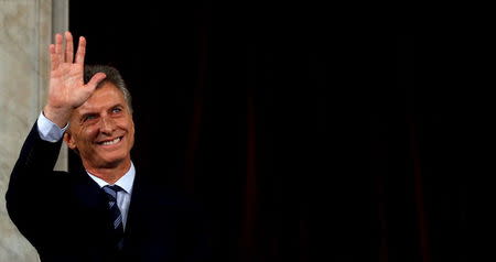 Argentina's President Mauricio Macri waves as he arrives for the opening session of the 134th legislative term at the Congress in Buenos Aires, Argentina, March 1, 2016. REUTERS/Marcos Brindicci