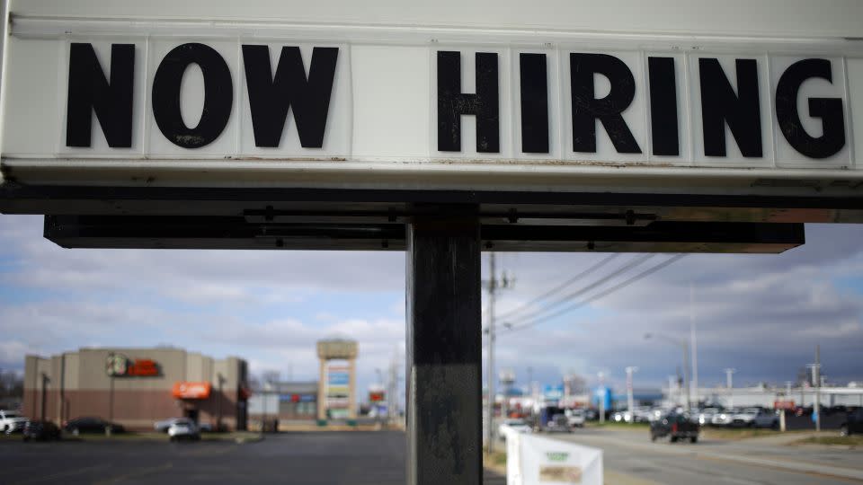 Economists predicted the US economy would enter a recession as the Federal Reserve began its aggressive rate-hiking campaign to tame inflation. Instead, the labor market remained resilient, adding hundreds of thousands of jobs each month since. - Luke Sharrett/Bloomberg/Getty Images