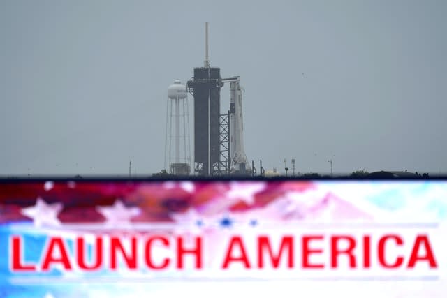 The SpaceX Falcon 9, with the Crew Dragon spacecraft on top of the rocket, sits on Launch Pad 39-A M(David J. Phillip/AP)