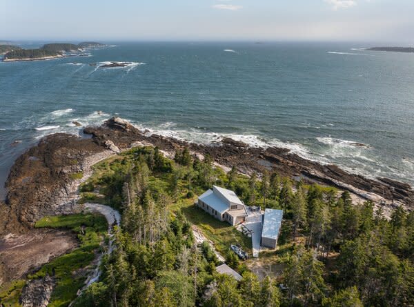 The remote Harbor Island location seems a world away from the mainland. The home was sited to capture different views—water, forest, and meadow.