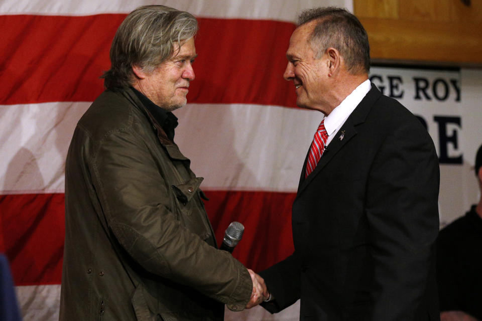 Republican candidate for U.S. Senate Judge Roy Moore and former White House chief strategist Steve Bannon shake hands during a campaign event in Fairhope, Alabama on Dec. 5, 2017 (Photo: Jonathan Bachman / Reuters)