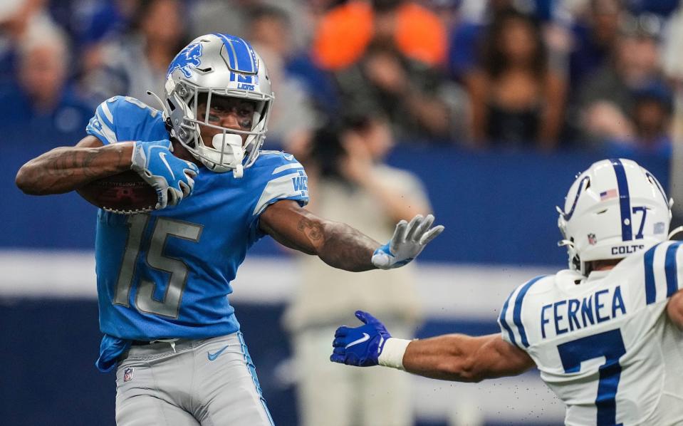 Aug 20, 2022; Indianapolis, Indiana, USA;   Detroit Lions wide receiver Maurice Alexander (15) rushes past Indianapolis Colts wide receiver Ethan Fernea (7) on Saturday, August 20, 2022 at Lucas Oil Stadium in Indianapolis.