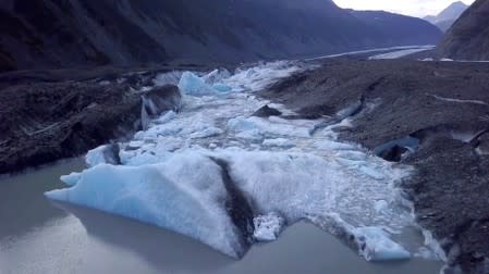 An aerial view shows the terminus of the Valdez Glacier in Alaska